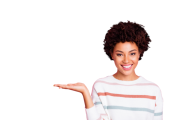 Photo of pretty dark skin wavy lady holding on open palm new cheap product advising buyers wear striped pullover isolated pastel pink color background