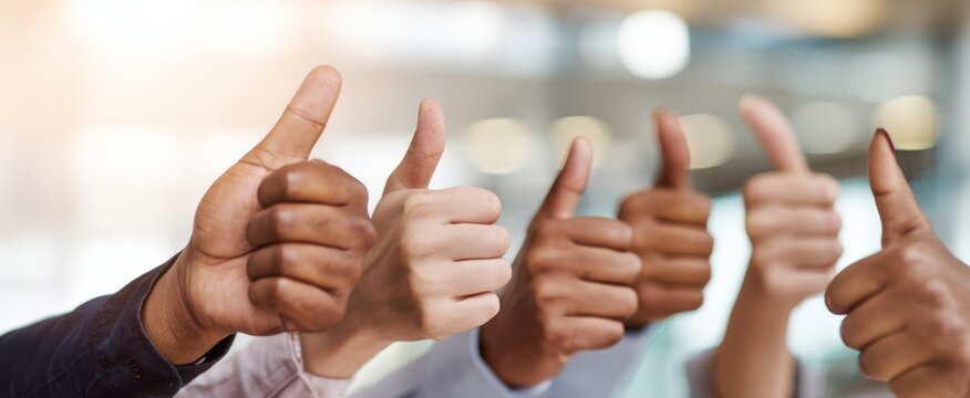 The Thumbs Up Gesture Signifying Team Success and Positive Collaboration - Powered by Adobe