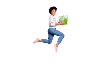 Full length body size photo of excited fast quick crazy funny girlfriend black skinned cute cheerful wearing jeans denim striped sweater holding giftbox with hands isolated pastel color background