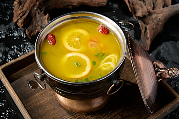 Orange chicken soup base for small hot pot