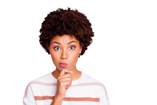 Photo of amazed misunderstanding cute funny black woman touching her chin lost deeply in thoughts wearing white striped sweated isolated over pink pastel color background