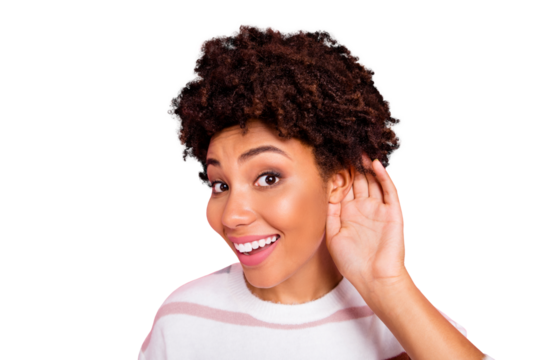 Close up photo of curly trendy cute sweet charming darkish skinned lady smiling toothily eavesdropping talks with cheerful unexpected facial expression isolated pink pastel color background
