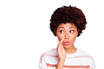 Photo of funny dark skin lady sending voice message to friend at classroom trying to avoid teacher notice it wear white striped pullover isolated pink color background