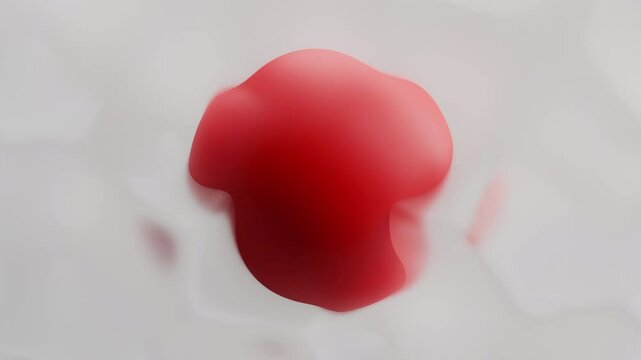 A red sphere emerges from a misty, muted background