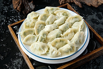 Handmade dumplings with chive and pork filling