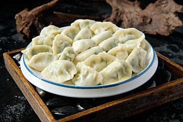 Handmade dumplings with chive and pork filling