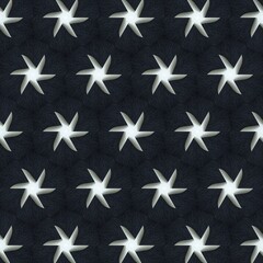 A beautiful pattern of white stars on a dark background
