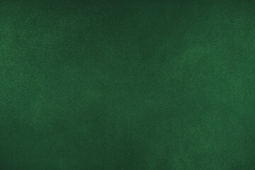 Abstract grungy texture background with different shades of dark matte green color. Painted canvas, concrete surface, studio backdrop, grainy textured effect