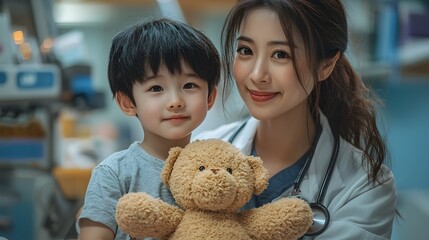 Compassionate pediatrician comforting a young patient with a soft toy