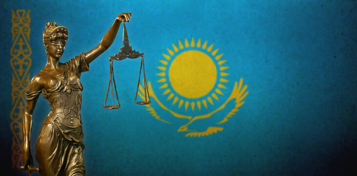 Lady Justice before a flag of Kazakhstan