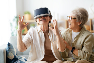 women playing console games wearing vr goggles