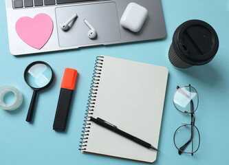 office supplies on a blue background
