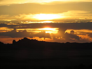 Beautiful sunset through the clouds over the Rocky Mountains of the USA 