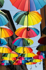 Colorful umbrellas decorating a street in Madrid