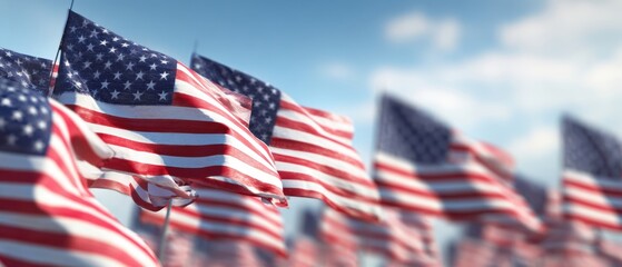 The American flags waving proudly under a clear blue sky.