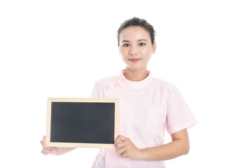 Obraz premium Young Chinese female nurse on white background
