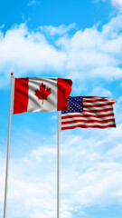 USA and Canada Flags Waving in the wind
