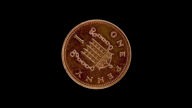 United Kingdom 2007 one penny coin reverse with crowned portcullis design rotating on black background