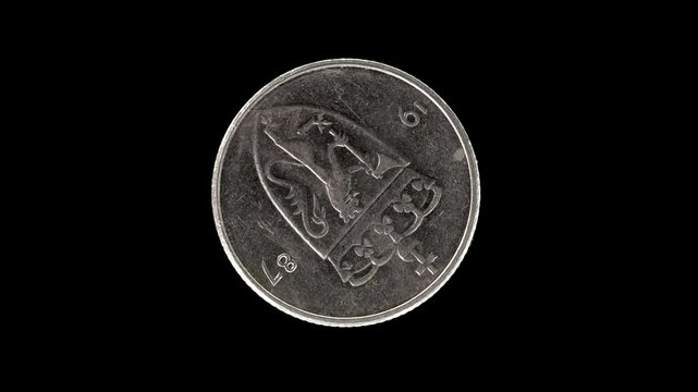 Norway 1987 50 &oslash;re coin obverse with crowned shield bearing Norwegian lion rotating on black background