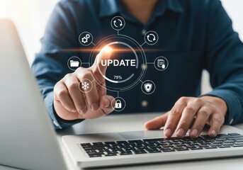 Man updating software on laptop with digital interface icons