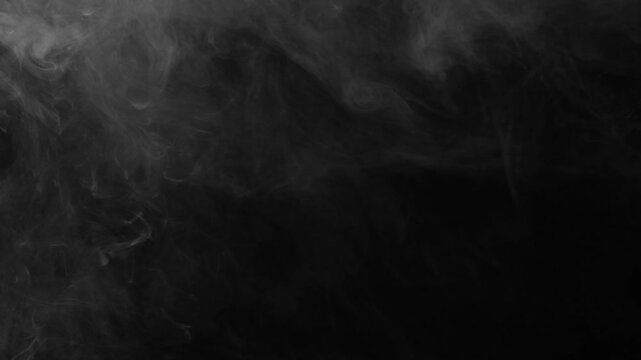 Mysterious white fog swirls gently in upper left on a black screen, creating an eerie, atmospheric background or overlay