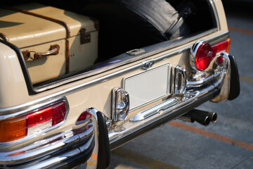 A classic car trunk with polished chrome and vintage design, show the automotive craftsmanship and...