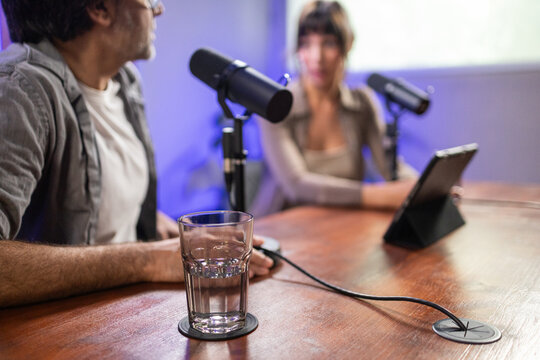Podcast recording session with man and woman