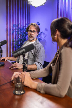 Podcast recording session in modern studio setting