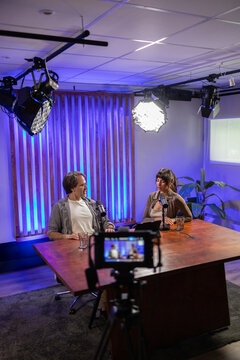 Podcast recording studio setup with interview session