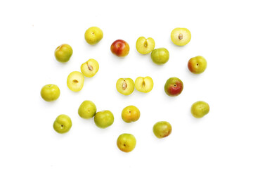 Fresh green plum fruit on white background.