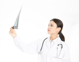 Young Chinese female doctor on white background