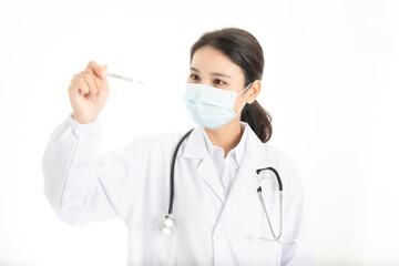 Young Chinese female doctor on white background