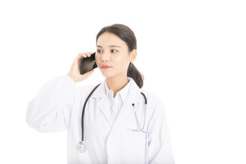Young Chinese female doctor on white background