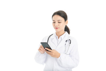 Fototapeta premium Young Chinese female doctor on white background