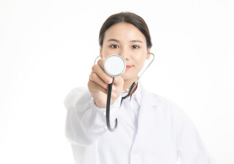 Young Chinese female doctor on white background
