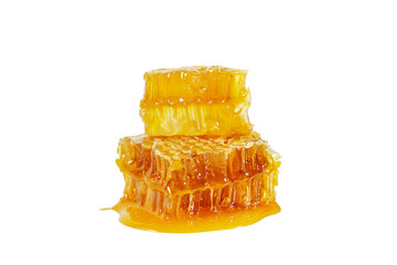 Honeycombs with flowing honey isolated on white background.