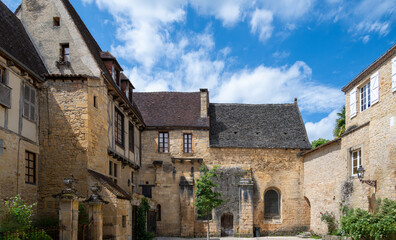 The medieval square Cour des Chanoines (Courtyard of the Canons) in Sarlat in the Perigord region, France;