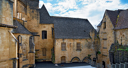 Open-air stage in the courtyard of the cathedral of the Abbey of Saint-Sauveur for the annual theatre festival in Sarlat-la-Canéda in the Perigord, France