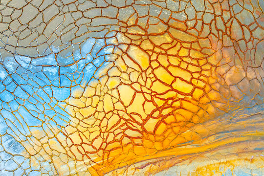 Painted mud creating colorful aerial abstract art