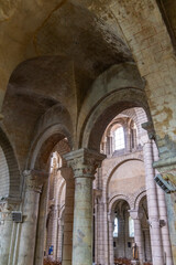 Fototapeta premium Romanesque arches and columns supporting the ceiling of Poitiers Cathedral in France