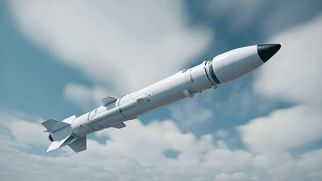 White Missile Ascending Through Partly Cloudy Sky