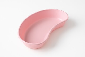 Soft pink plastic tray designed for medical procedures