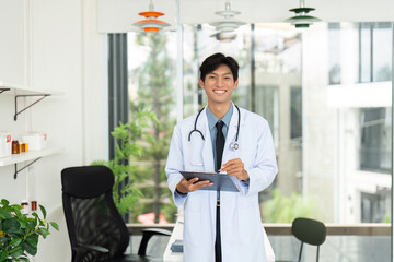 Healthcare Professional. A smiling doctor in a lab coat holding a clipboard in a modern clinic.