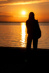 silhouette girl in sunset