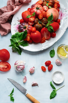 Fresh ingredients for cold tomato soup preparation