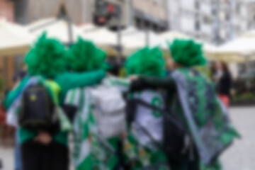 Real Betis and Chelsea fans on the street in Wroclaw. Blurred background