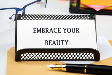 The conceptual phrase EMBRACE YOUR BEAUTY. The concept of beauty and health