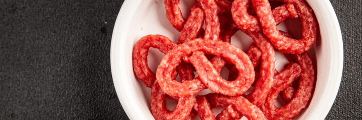 Salami snack mold brezel sausage mini fresh delicious gourmet food background on the table rustic food top view copy space