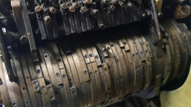 Close-up of a dusty cam drum from a 1950s sock knitting machine, once part of Yugoslavia&rsquo;s textile industry. Vintage metal parts and worn industrial details evoke a bygone era