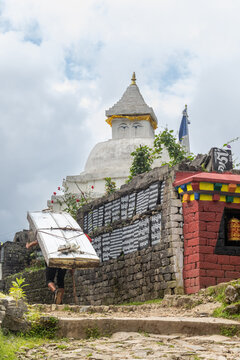 Monastery scene around Everest with stupa and prayer flags